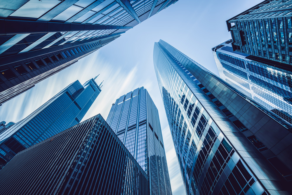 Looking up through skyscrapers in the city